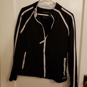 Headphone accessible pocketed running jacket